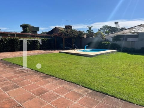 Casa com 306m², 5 dormitórios, 1 suíte, no bairro Atlântida em Xangri-Lá