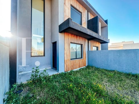Casa com 120m², 3 dormitórios, 2 suítes, 1 vaga, no bairro Noiva do Mar em Xangri-Lá