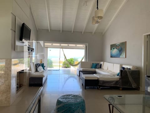 Casa com 235m², 3 dormitórios, 1 suíte, 2 vagas, no bairro Atlântida em Xangri-Lá