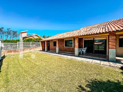 Casa com 146m², 4 dormitórios, 1 suíte, 2 vagas, no bairro Remanso em Xangri-Lá