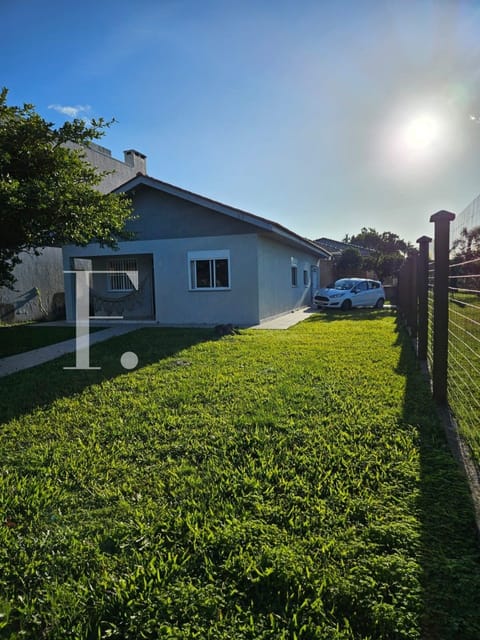 Casa com 94m², 3 dormitórios, 2 vagas, no bairro Xangri-Lá em Xangri-Lá
