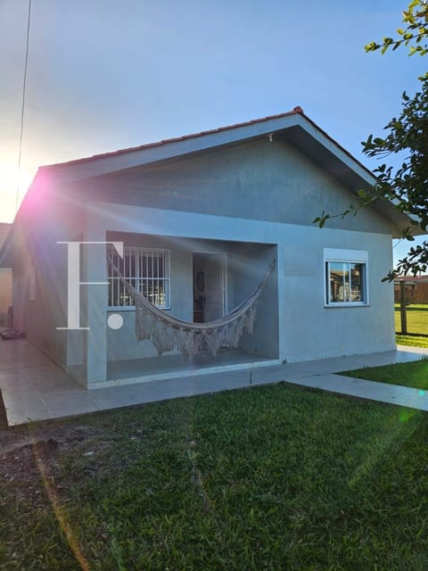 Casa com 94m², 3 dormitórios, 2 vagas, no bairro Xangri-Lá em Xangri-Lá