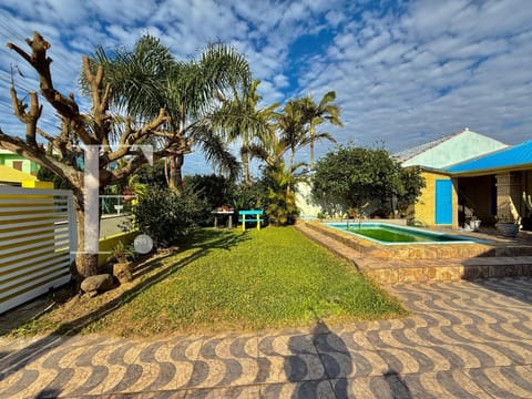 Casa com 123m², 4 dormitórios, 2 vagas, no bairro Noiva do Mar em Xangri-Lá