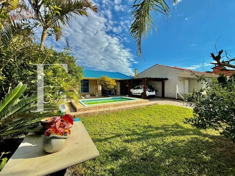 Casa com 123m², 4 dormitórios, 2 vagas, no bairro Noiva do Mar em Xangri-Lá