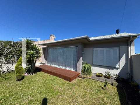 Casa com 118m², 3 dormitórios, 2 suítes, 2 vagas, no bairro Remanso em Xangri-Lá