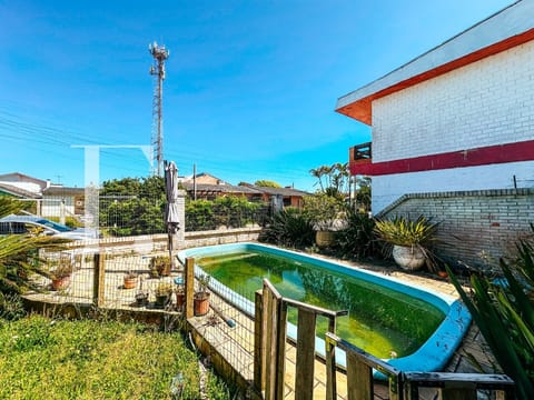 Casa com 195m², 4 dormitórios, 1 suíte, 3 vagas, no bairro Rainha do Mar em Xangri-Lá