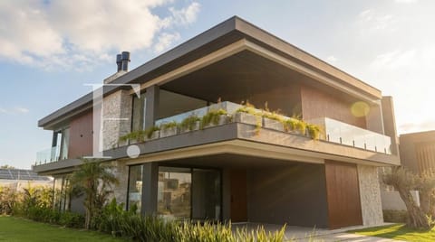 Sobrado com 415m², 6 dormitórios, 6 suítes, 2 vagas, Los Cobos em Xangri-Lá