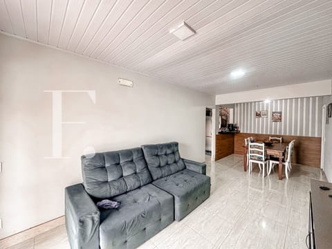Casa com 80m², 2 dormitórios, 4 vagas, no bairro Centro em Xangri-Lá
