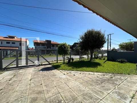 Casa com 140m², 3 dormitórios, 1 suíte, 2 vagas, no bairro Centro em Xangri-Lá