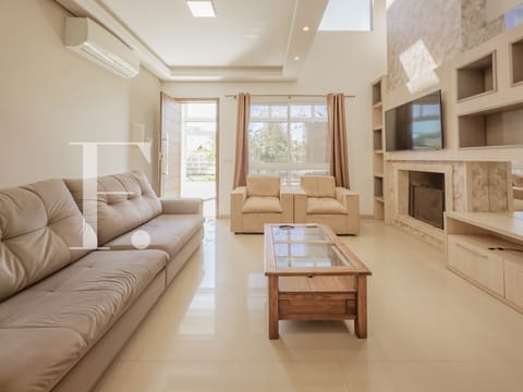 Casa com 222m², 3 dormitórios, 2 suítes, no bairro Atlântida em Xangri-Lá