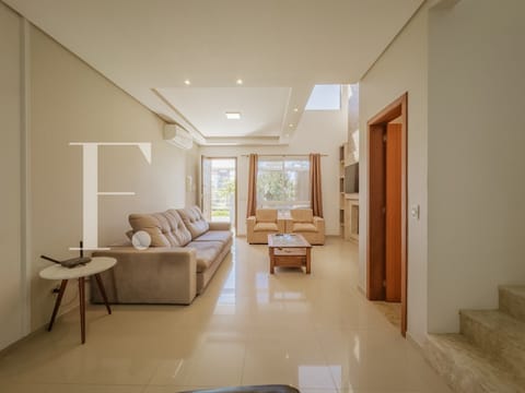 Casa com 222m², 3 dormitórios, 2 suítes, no bairro Atlântida em Xangri-Lá
