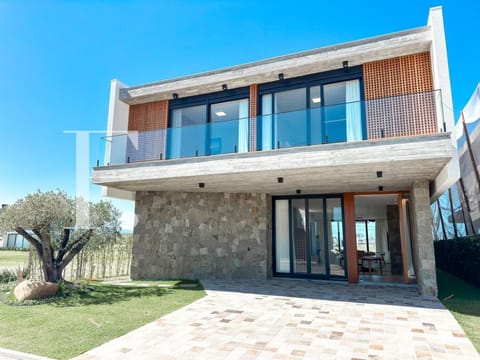 Sobrado com 370m², 5 dormitórios, 5 suítes, 2 vagas, Amare Home Resort em Xangri-Lá