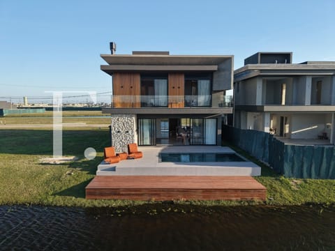 Sobrado com 235m², 4 dormitórios, 4 suítes, 2 vagas, Zen Concept Resort em Xangri-Lá