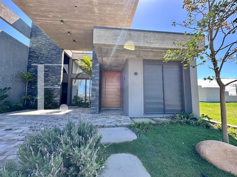 Casa com 171m², 3 dormitórios, 3 suítes, 2 vagas, Santorini em Xangri-Lá