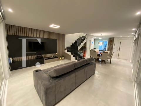 Casa Condomínio com 141m², 3 dormitórios, 1 suíte, 2 vagas, One Atlântida Houses em Xangri-Lá