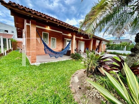Casa com 521m², 3 dormitórios, 1 suíte, 2 vagas, no bairro Atlântida em Xangri-Lá