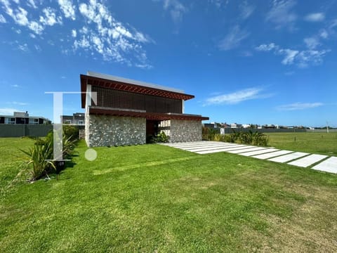 Sobrado com 310m², 5 dormitórios, 5 suítes, 2 vagas, Lótus em Xangri-Lá