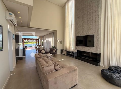 Sobrado com 214m², 4 dormitórios, 4 suítes, 2 vagas, Riviera em Xangri-Lá
