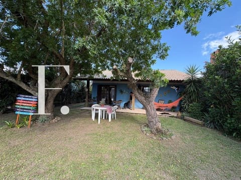 Casa com 98m², 2 dormitórios, 1 suíte, 2 vagas, no bairro Centro em Xangri-Lá
