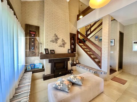 Casa com 261m², 4 dormitórios, 2 suítes, 2 vagas, no bairro Centro em Xangri-Lá