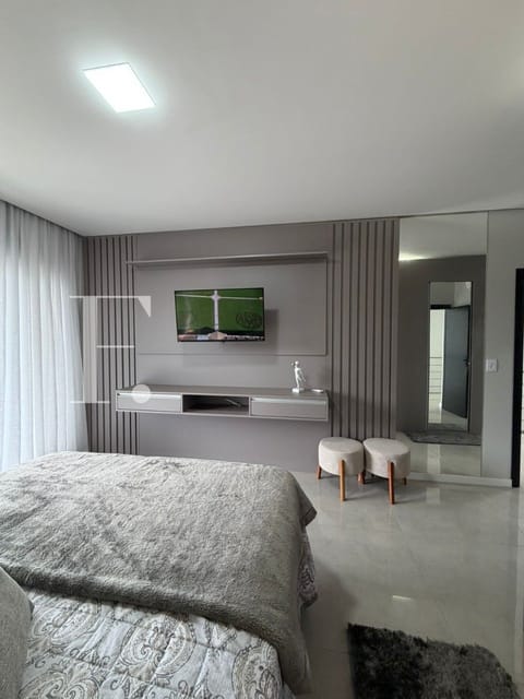 Sobrado com 415m², 4 dormitórios, 4 suítes, 2 vagas, Velas da Marina em Capão da Canoa