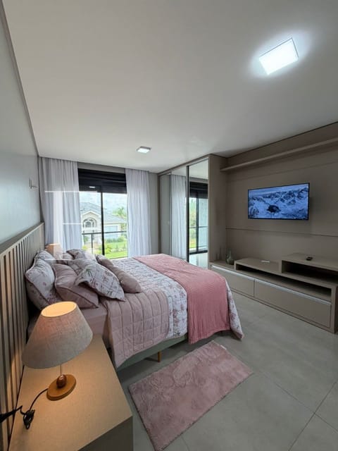 Sobrado com 415m², 4 dormitórios, 4 suítes, 2 vagas, Velas da Marina em Capão da Canoa