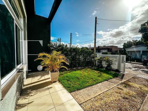 Casa com 124m², 2 dormitórios, 1 suíte, 2 vagas, no bairro Noiva do Mar em Xangri-Lá