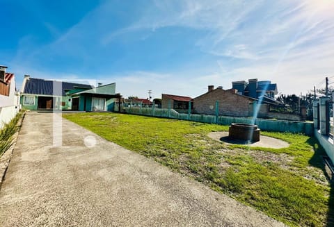 Casa com 110m², 3 dormitórios, 1 suíte, 2 vagas, no bairro Noiva do Mar em Xangri-Lá