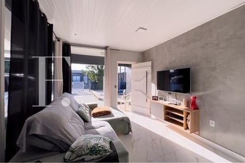 Casa com 198m², 3 dormitórios, 2 vagas, no bairro Noiva do Mar em Xangri-Lá