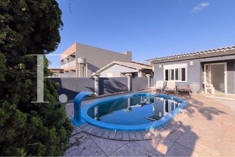 Casa com 198m², 3 dormitórios, 2 vagas, no bairro Noiva do Mar em Xangri-Lá