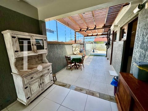 Casa com 153m², 3 dormitórios, 1 suíte, no bairro Centro em Xangri-Lá