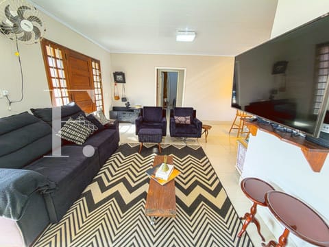 Casa com 130m², 4 dormitórios, 2 suítes, 2 vagas, no bairro Centro em Xangri-Lá