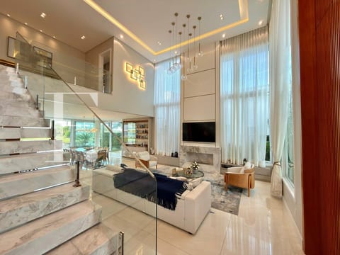 Sobrado com 420m², 5 dormitórios, 5 suítes, 2 vagas, Enseada Lagos em Xangri-Lá