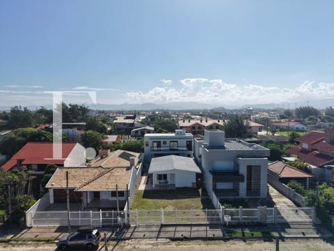Casa com 112m², 5 dormitórios, 2 vagas, no bairro Centro em Xangri-Lá