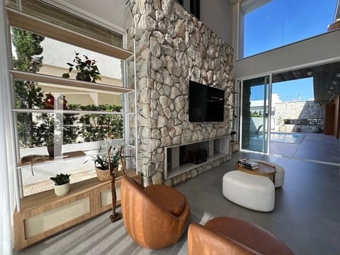 Casa Condomínio com 300m², 4 dormitórios, 4 suítes, 2 vagas, Atlântico Villas Club em Atlântida Sul