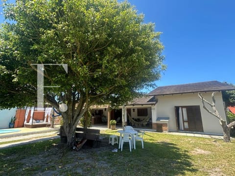 Casa com 124m², 5 dormitórios, 2 vagas, no bairro Rainha do Mar em Xangri-Lá