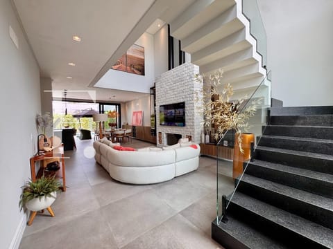 Sobrado com 211m², 4 dormitórios, 4 suítes, 2 vagas, Blue em Xangri-Lá