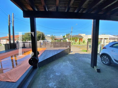 Casa com 188m², 3 dormitórios, 2 vagas, no bairro Centro em Xangri-Lá