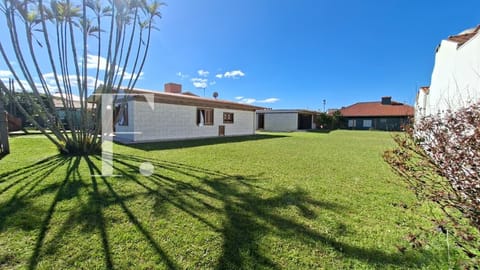 Casa com 122m², 3 dormitórios, 2 vagas, no bairro Rainha do Mar em Xangri-Lá