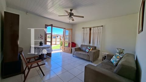 Casa com 122m², 3 dormitórios, 2 vagas, no bairro Rainha do Mar em Xangri-Lá