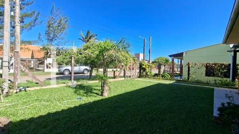 Casa com 112m², 3 dormitórios, 3 vagas, no bairro Rainha do Mar em Xangri-Lá
