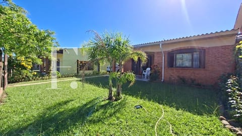 Casa com 112m², 3 dormitórios, 3 vagas, no bairro Rainha do Mar em Xangri-Lá