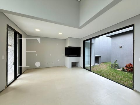 Casa com 92m², 3 dormitórios, 1 suíte, 2 vagas, no bairro Noiva do Mar em Xangri-Lá