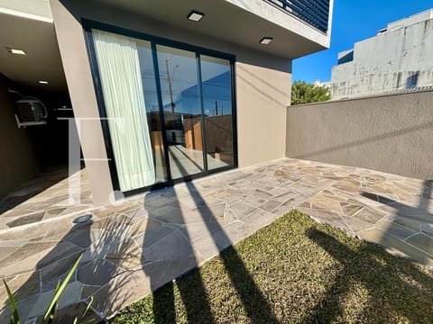 Casa com 146m², 3 dormitórios, 1 suíte, 2 vagas, no bairro Centro em Xangri-Lá