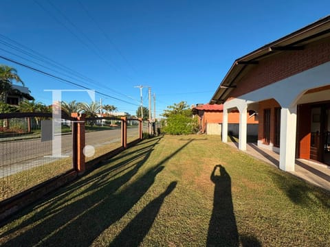 Casa com 182m², 5 dormitórios, 1 suíte, 2 vagas, no bairro Centro em Xangri-Lá