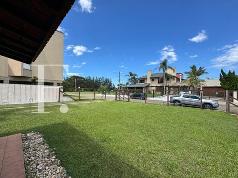 Casa com 594m², 3 dormitórios, 4 vagas, no bairro Atlântida em Xangri-Lá