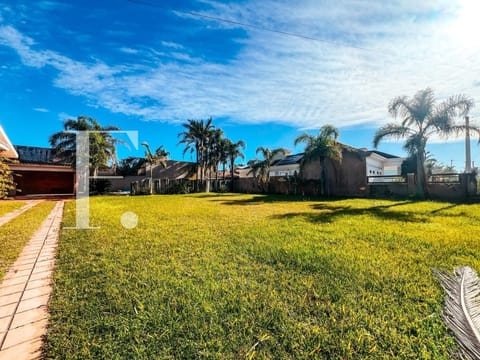 Casa com 140m², 3 dormitórios, 1 suíte, 4 vagas, no bairro Atlântida em Xangri-Lá