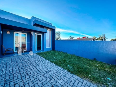 Casa com 100m², 3 dormitórios, 1 suíte, 2 vagas, no bairro Centro em Xangri-Lá