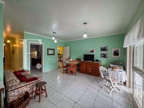 Casa com 166m², 3 dormitórios, 1 suíte, 3 vagas, no bairro Centro em Xangri-Lá