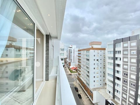 Apartamento com 65m², 2 dormitórios, 1 suíte, 1 vaga, Absoluto Palace em Capão da Canoa